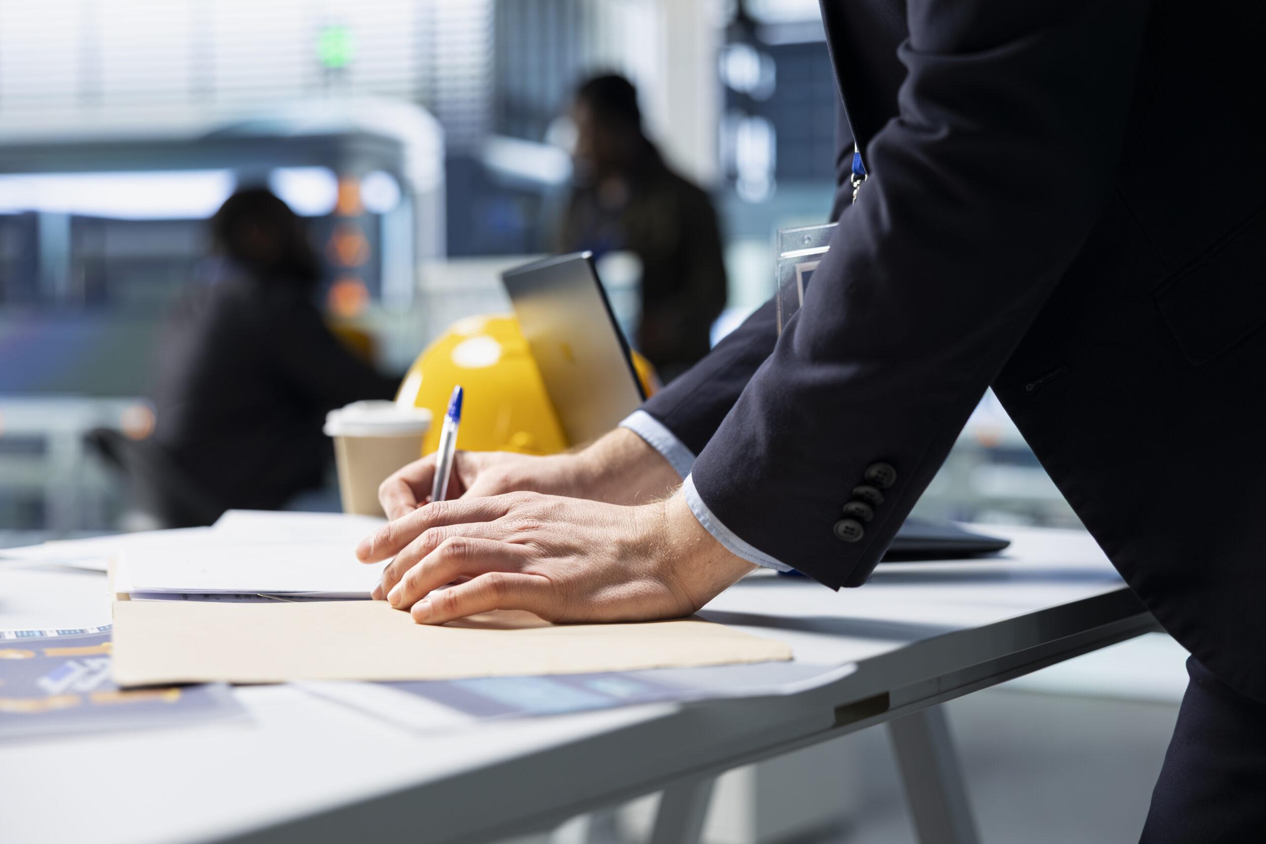 Building Contractor Overseeing Green Technology In A High Tech Facility